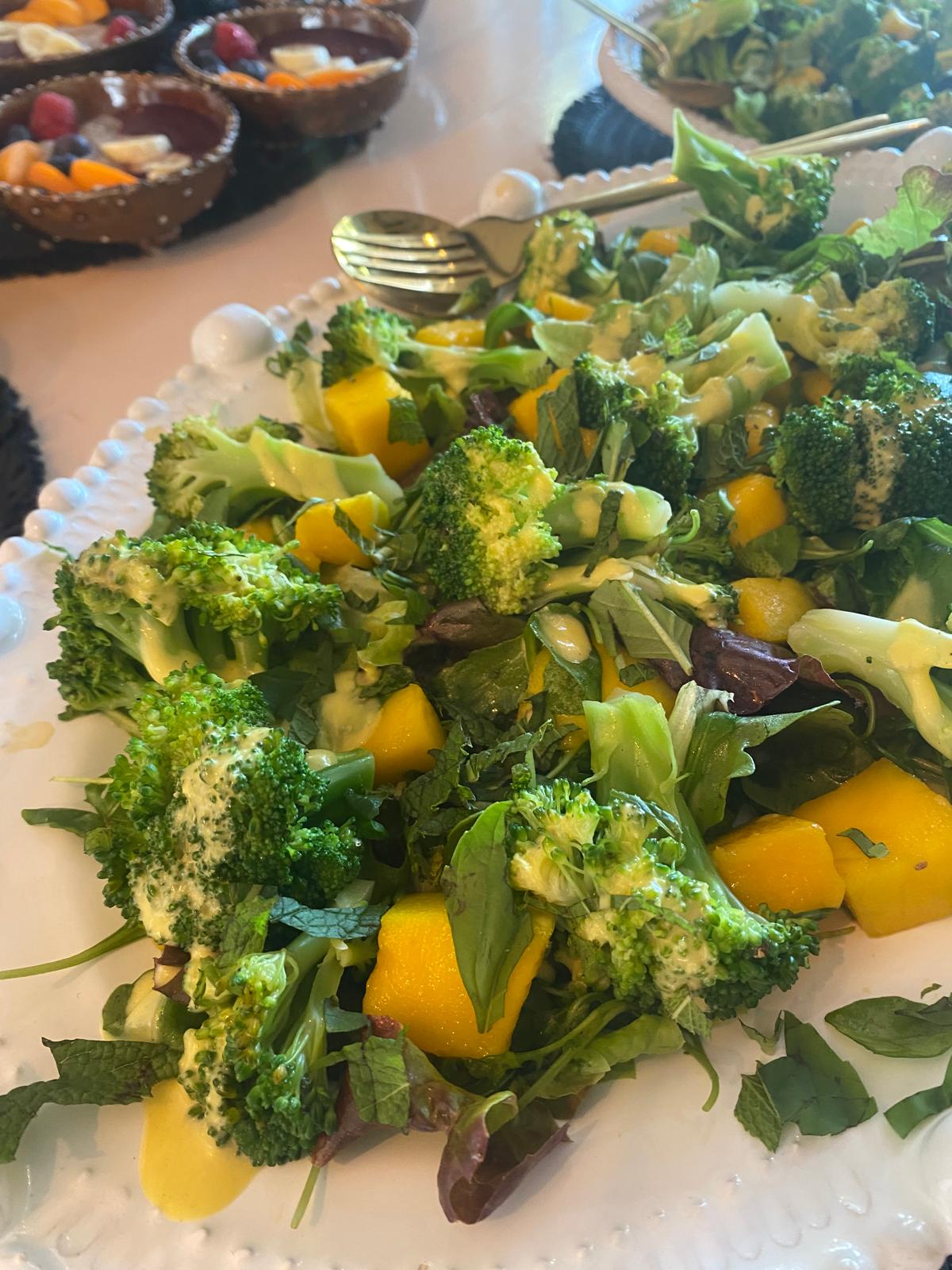 Broccoli and mango salad with fresh garden herbs