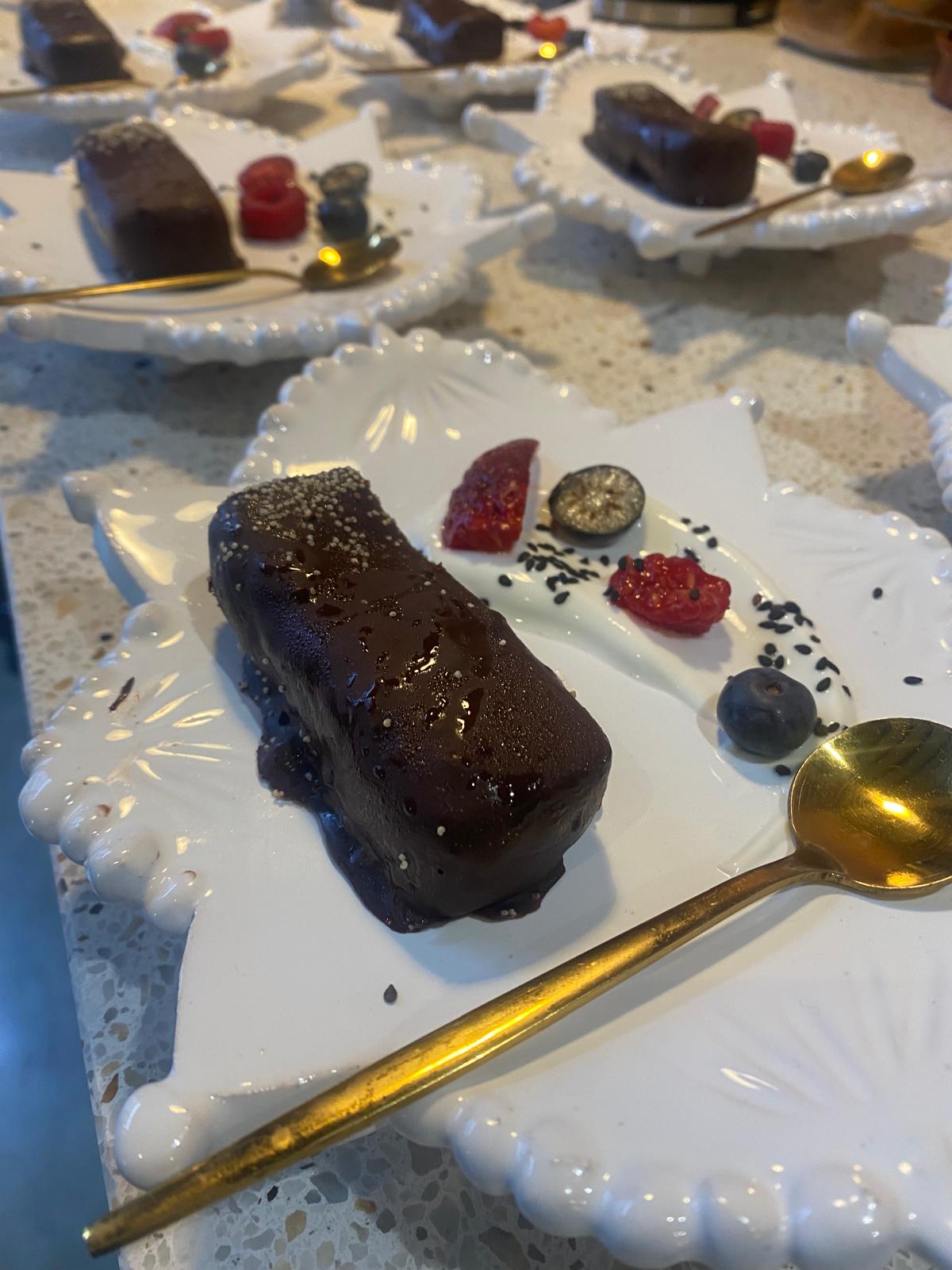 Raw chocolate dessert with berries and coconut yoghurt