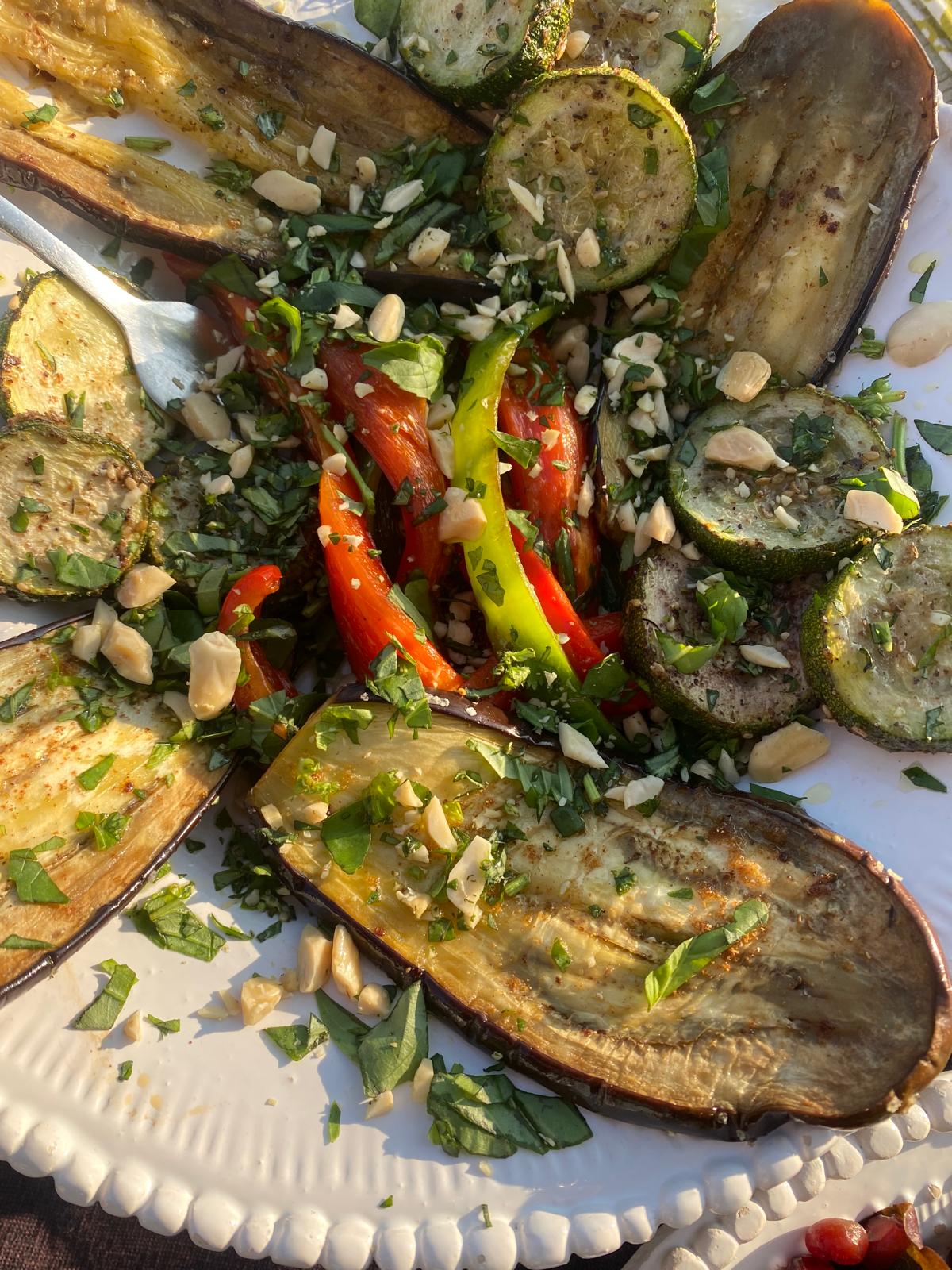 Grilled Mediterranean vegetables with herbs and toasted almonds